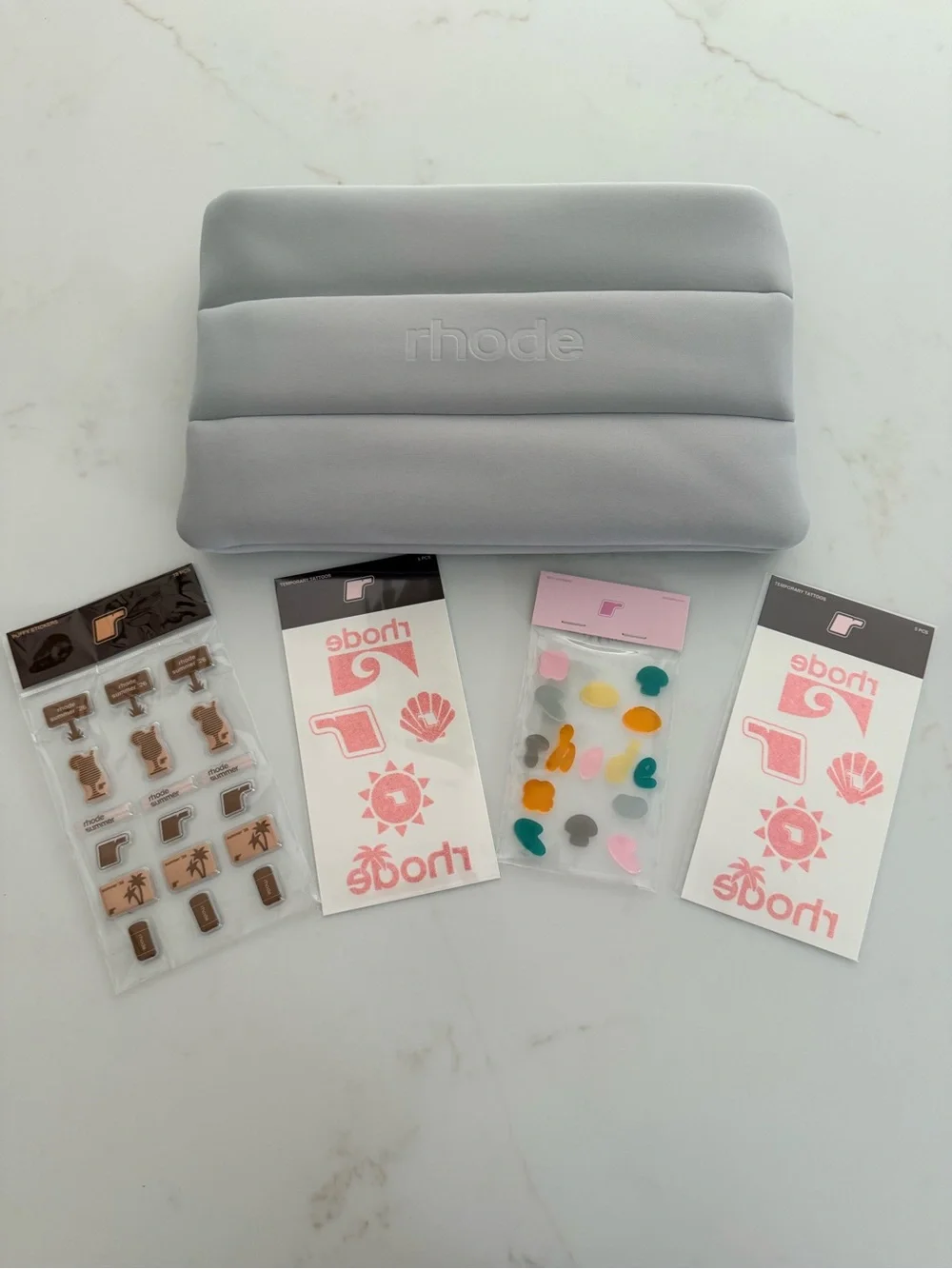 RHODE Limited Release Padded Cosmetic Pouch + Summer ’26 Sticker Tattoo Bundle
